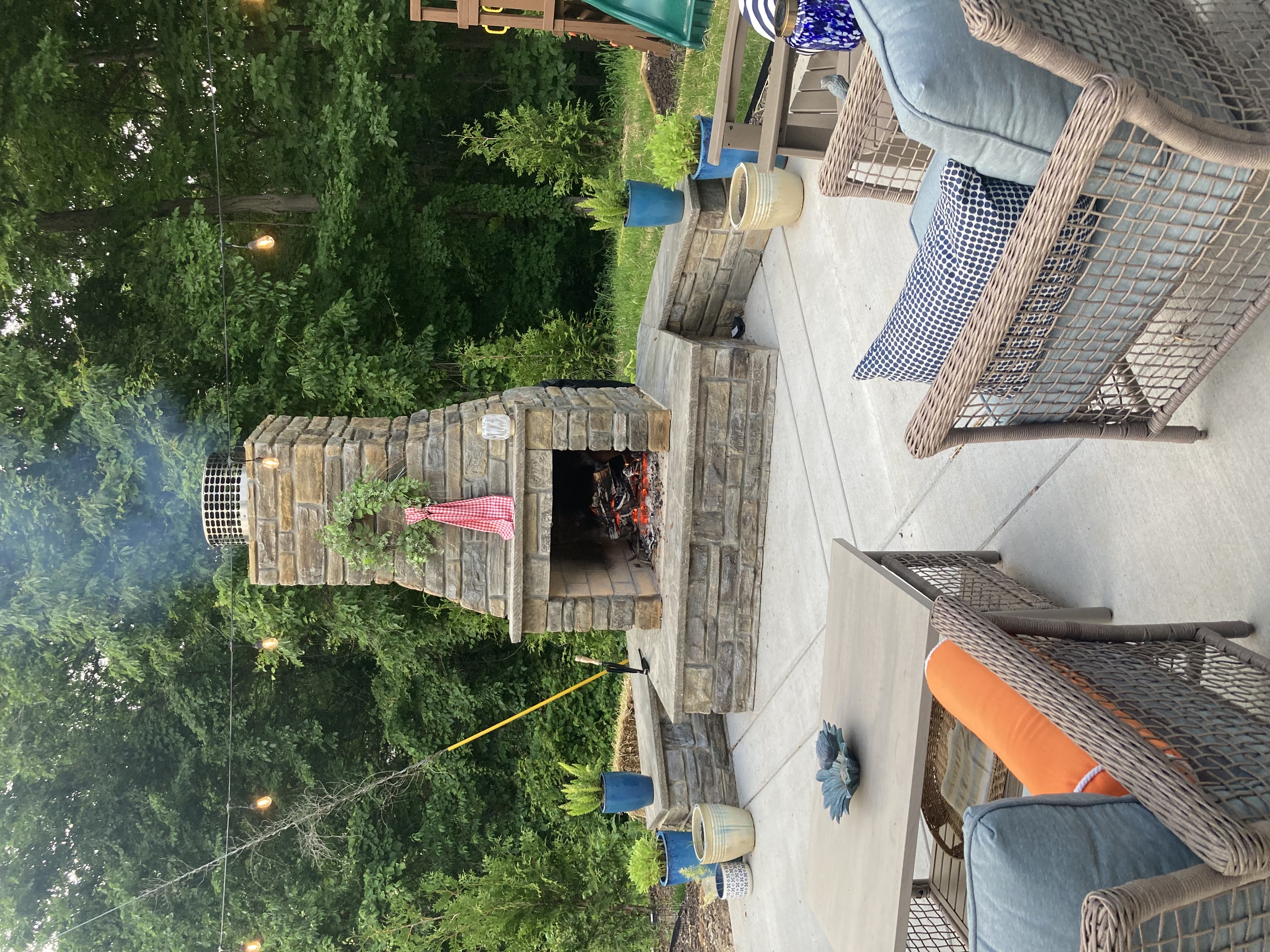 Custom fire pit and outdoor kitchen